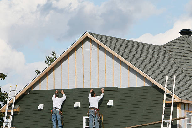Professional Emergency Siding Repair technician working in Geneva, OH